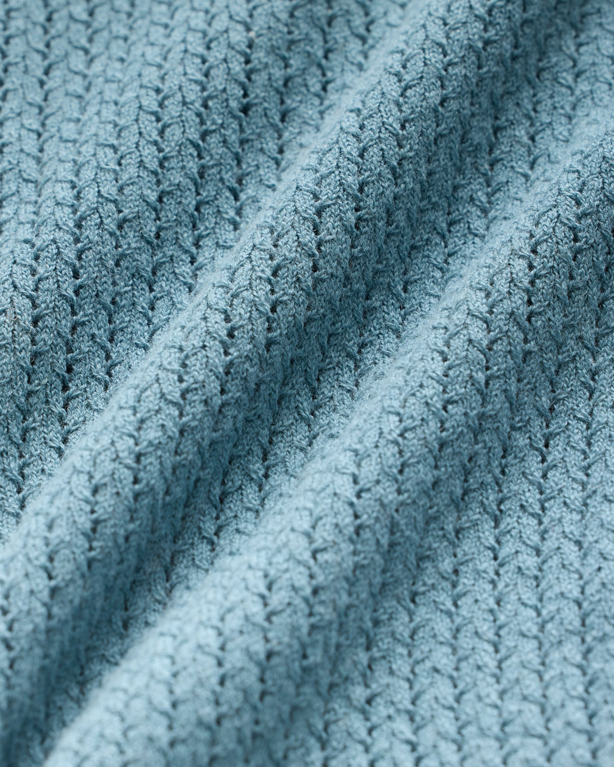 MICRO CABLE-KNIT SWEATER