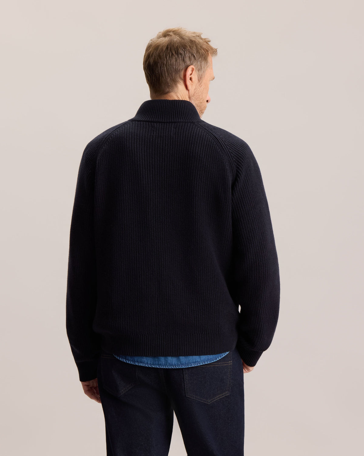 ESSENTIAL QUARTER-ZIP SWEATER