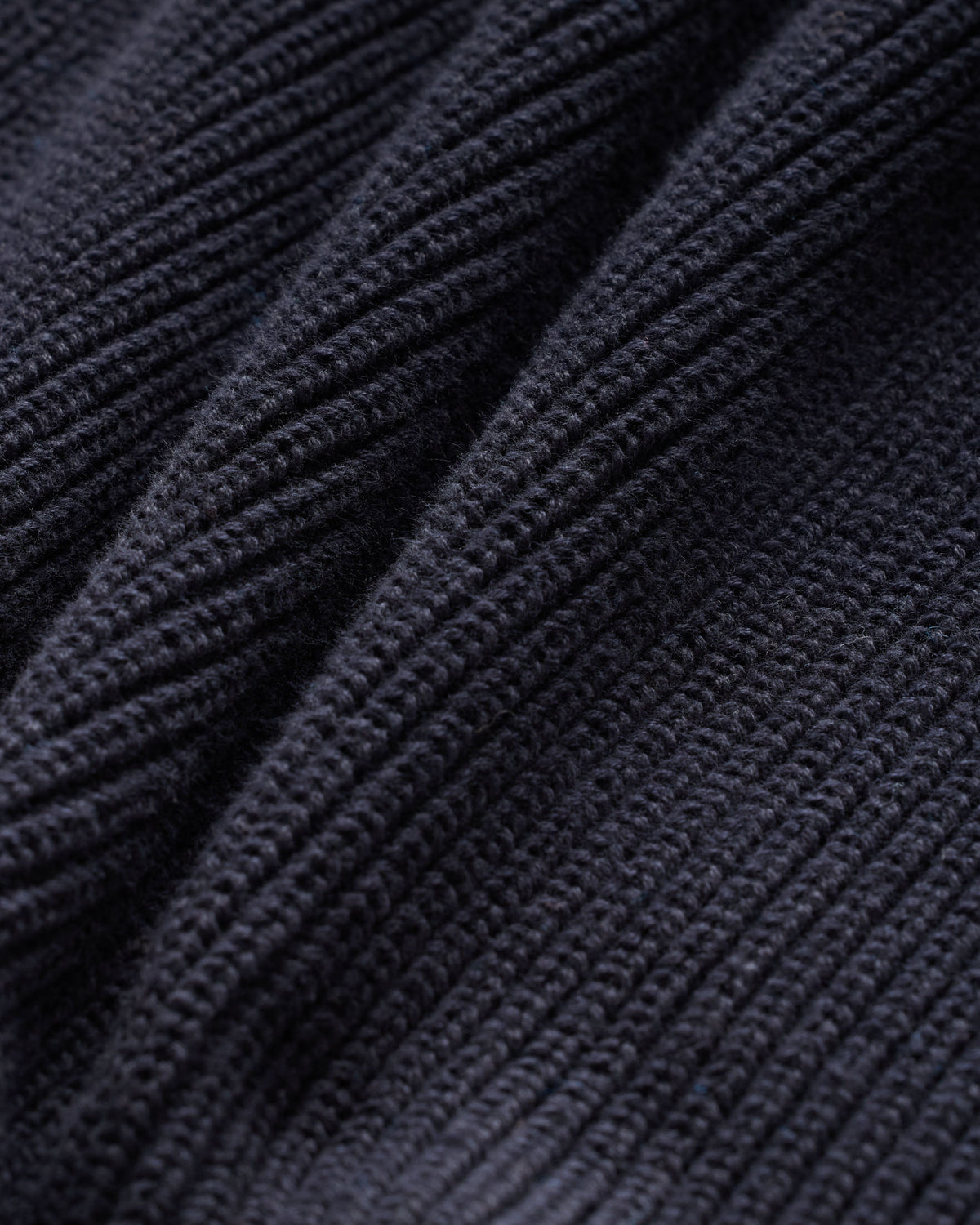 ESSENTIAL QUARTER-ZIP SWEATER